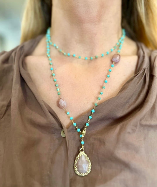 Collana lunga con cristalli e pendente