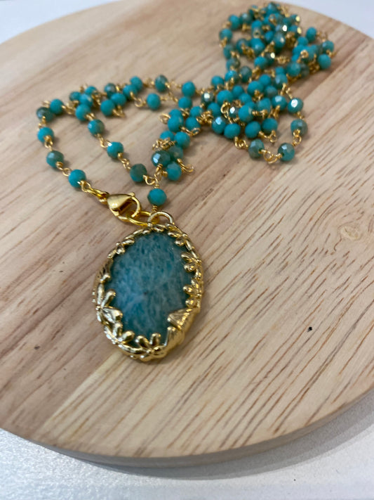 Collana lunga con pendente